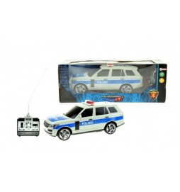 Auto RC policie plast 25cm na dálkové ovládání na baterie se světlem se v krabici 28x11x10cm